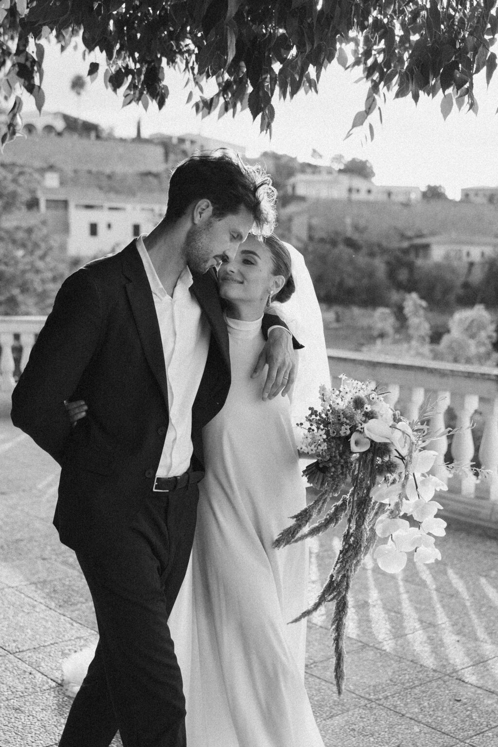 bride and groom walking.